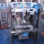 SW-420F machine doors open showing internal structure