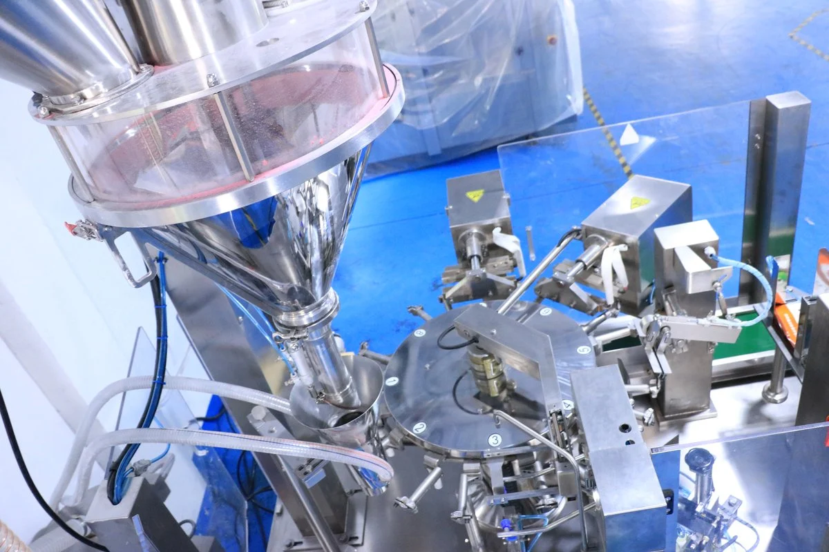 SW-L200 auger screw filler and stainless steel hopper — top view of 8-station rotary carousel