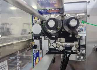 SW-1328三边封包装机上用于打印生产日期和有效期的双喷头色带打码机