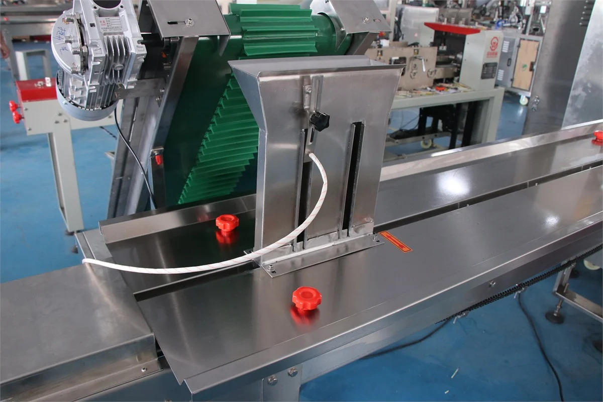 Two-stage end seal detail on SW-100 liquid ice pop pillow pouch — cooling-set seal after liquid fill